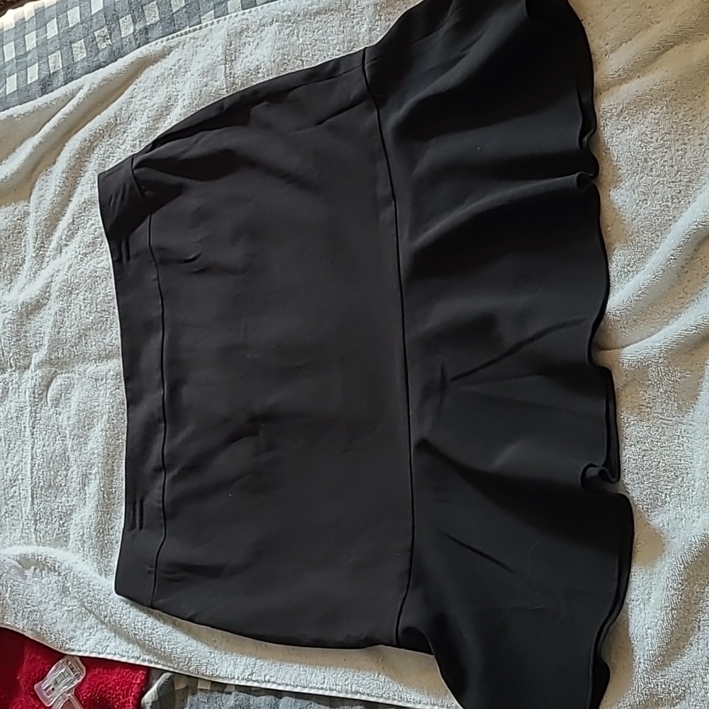 Women's skirt size 12 black lined. No signs of wear, rarely worn.
